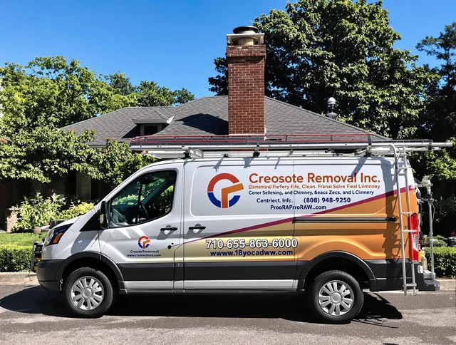 Concord Chimney Sweep technician removing creosote safely in Concord, MA